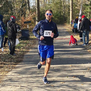 Author Dylan Roche Running in a race near Annapolis, Maryland
