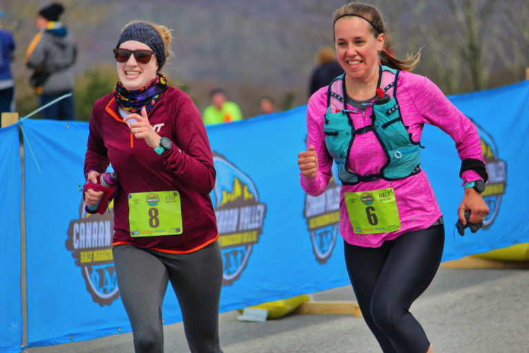 Runners crossing the finish line at the Canaan Valley Half Marathon, 10K, and 5K